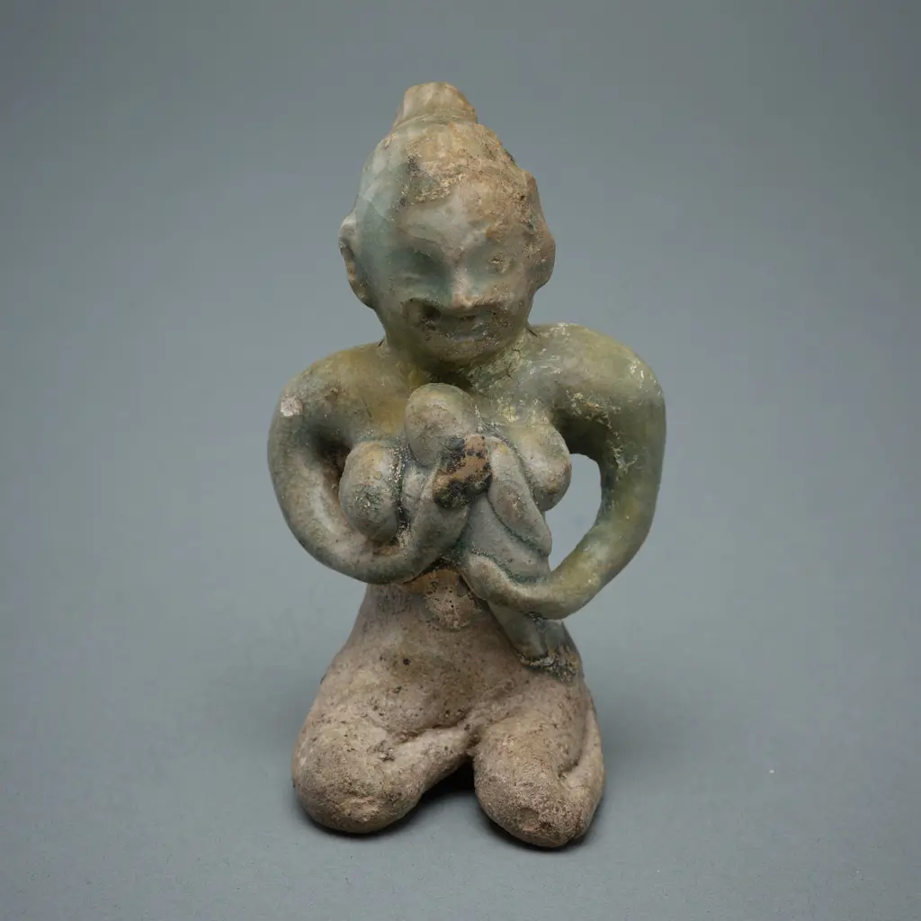 A Sawankhalok stoneware figure (tukatha), Image 1++
